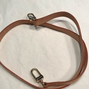LV Purse strap.